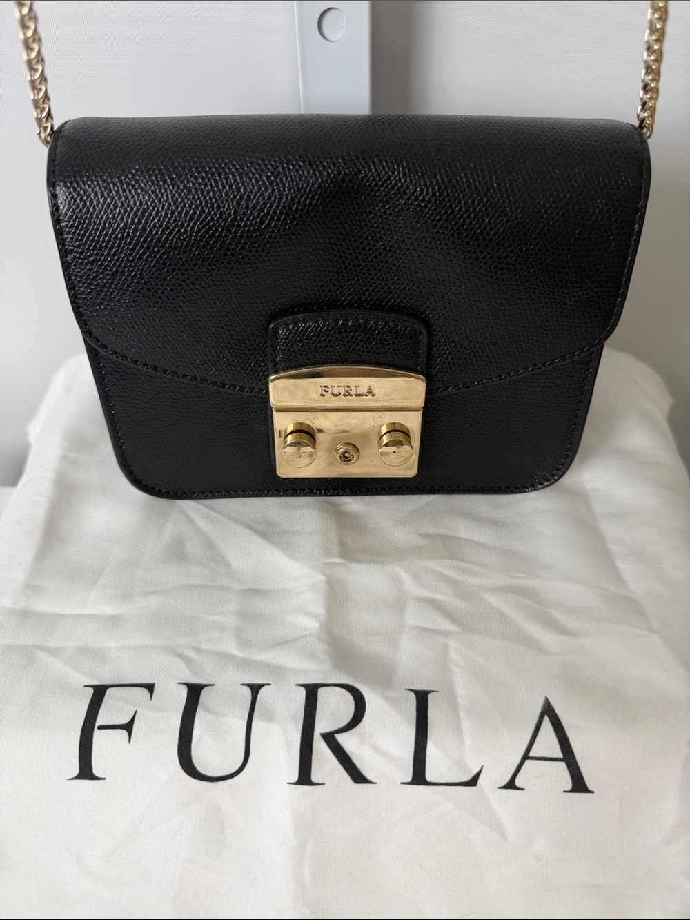 Furla Black Leather Crossbody with Gold Lock and Chain